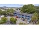 A spacious blue two-story apartment complex offers ample parking and is surrounded by lush greenery at 505 28Th Ave. N, Myrtle Beach, SC 29577