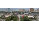 An aerial view showcases a property close to the beach and surrounded by lush greenery, buildings, and commercial establishments at 505 28Th Ave. N, Myrtle Beach, SC 29577