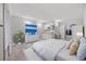 This well-lit bedroom features a calming gray color palette and a compact kitchen area at 505 28Th Ave. N, Myrtle Beach, SC 29577