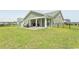 Expansive backyard with a patio and outdoor seating area, perfect for relaxation and entertaining at 5059 Sundrop Ln., Little River, SC 29566