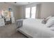 Comfortable bedroom with a desk, chair and a large window, creating a bright and inviting space at 5059 Sundrop Ln., Little River, SC 29566