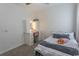 Comfortable bedroom with carpeted floors, bright natural light, and a quaint vanity at 5059 Sundrop Ln., Little River, SC 29566