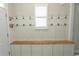 Functional mudroom featuring custom cabinets, a built-in bench, and ample storage for everyday essentials at 5059 Sundrop Ln., Little River, SC 29566