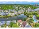 Beautiful aerial view of home in a desirable community with pond views and mature trees at 521 Bay Drive Ext., Garden City Beach, SC 29576