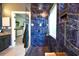 Modern shower with blue tiling and a glass partition at 5718 Herring Gull Circle, North Myrtle Beach, SC 29582