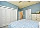 Comfortable bedroom featuring a closet and blue accent wall at 5718 Herring Gull Circle, North Myrtle Beach, SC 29582