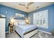 Inviting bedroom featuring neutral paint and shutters at 5718 Herring Gull Circle, North Myrtle Beach, SC 29582