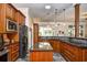 Stylish kitchen featuring wood cabinets, stainless steel appliances, and a skylight at 5718 Herring Gull Circle, North Myrtle Beach, SC 29582