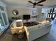 Comfortable living area with neutral tones, a ceiling fan, and access to other rooms at 5718 Herring Gull Circle, North Myrtle Beach, SC 29582