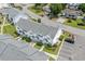Aerial view of a white townhome complex with parking at 613 S 2Nd Ave. # 21D, North Myrtle Beach, SC 29582