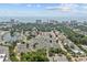 Aerial view of a white townhome complex with distant ocean views at 613 S 2Nd Ave. # 21D, North Myrtle Beach, SC 29582
