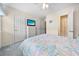 Cozy bedroom with double bed, television and ensuite bathroom in neutral tones at 613 S 2Nd Ave. # 21D, North Myrtle Beach, SC 29582