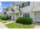 Charming townhouse exterior features a well-maintained lawn and inviting front porch at 613 S 2Nd Ave. # 21D, North Myrtle Beach, SC 29582