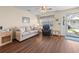 Inviting living room with hard wood flooring and neutral colored furnishings and ample natural light at 613 S 2Nd Ave. # 21D, North Myrtle Beach, SC 29582