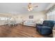 Bright living space with hardwood floors, dining area, and comfortable seating arrangements at 613 S 2Nd Ave. # 21D, North Myrtle Beach, SC 29582