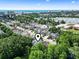 Aerial view of a residential area featuring homes surrounded by lush greenery and water views at 618 5Th Ave. S, North Myrtle Beach, SC 29582