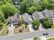 An aerial view shows the property's location in a tranquil neighborhood setting surrounded by mature trees at 618 5Th Ave. S, North Myrtle Beach, SC 29582