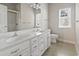 Bright bathroom with a window, double sink vanity, and separate shower at 618 5Th Ave. S, North Myrtle Beach, SC 29582