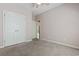 Neutral bedroom with a ceiling fan, window, and closet at 618 5Th Ave. S, North Myrtle Beach, SC 29582