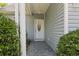 Charming front door with decorative glass and stone walkway at 618 5Th Ave. S, North Myrtle Beach, SC 29582