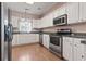 Well-appointed kitchen boasting stainless steel appliances and ample counter space for meal preparation at 618 5Th Ave. S, North Myrtle Beach, SC 29582