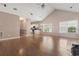 Open-concept living room with eat-in kitchen, vaulted ceilings, and natural light at 618 5Th Ave. S, North Myrtle Beach, SC 29582