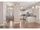 View of the front entrance, living room, and kitchen, showcasing the layout at 618 5Th Ave. S, North Myrtle Beach, SC 29582