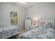 Bright bedroom with two twin beds and a window view at 6253 Catalina Dr. # 1523, North Myrtle Beach, SC 29582