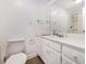 Bright bathroom featuring a large mirror, vanity, and a shower at 6813 Porcher Dr. # 1, Myrtle Beach, SC 29572