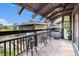 Outdoor patio featuring a grill, seating, lighting, and scenic views of the outdoors at 6813 Porcher Dr. # 1, Myrtle Beach, SC 29572