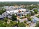 Overhead view of condos with swimming pool, landscaping, nearby shopping and parking at 6813 Porcher Dr. # 25, Myrtle Beach, SC 29572
