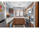 Kitchen featuring oak cabinets, stainless appliances, and neutral countertops at 6813 Porcher Dr. # 25, Myrtle Beach, SC 29572