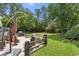 Inviting backyard patio area with comfortable seating and an outdoor grill at 6887 King Arthur Dr., Myrtle Beach, SC 29588