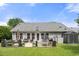 Beautiful backyard with a patio, grill, and storage shed, perfect for outdoor living at 6887 King Arthur Dr., Myrtle Beach, SC 29588