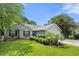 Attractive single-story home with brick accents, two car garage, and manicured landscaping at 6887 King Arthur Dr., Myrtle Beach, SC 29588