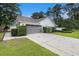 Well-maintained home exterior featuring a gray garage door at 7007 Blade Beak Ln., Myrtle Beach, SC 29588
