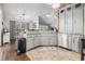 Modern kitchen with granite countertops, stainless steel appliances, and ample cabinet space at 7007 Blade Beak Ln., Myrtle Beach, SC 29588