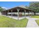 Community pavilion with picnic tables, swings, and seating at 7007 Blade Beak Ln., Myrtle Beach, SC 29588