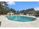 Enjoy the community pool with a bathhouse, lounge chairs, and shaded seating for relaxing summer days at 7007 Blade Beak Ln., Myrtle Beach, SC 29588