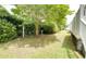 View of the backyard featuring established shrubbery and trees and a bird bath at 702 Beach Walk Pl. # 702, Myrtle Beach, SC 29577