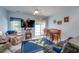 Bright dining area with a sliding glass door, open kitchen and comfortable seating at 702 Beach Walk Pl. # 702, Myrtle Beach, SC 29577