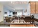 Open concept kitchen with breakfast bar, double sinks, stainless dishwasher and view to sitting room at 702 Beach Walk Pl. # 702, Myrtle Beach, SC 29577