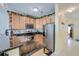 Well-equipped kitchen with stainless steel appliances and ample cabinet space for storage at 702 Beach Walk Pl. # 702, Myrtle Beach, SC 29577