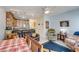 Relaxing living area with a dining table, open kitchen, and neutral decor at 702 Beach Walk Pl. # 702, Myrtle Beach, SC 29577