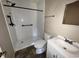 Bathroom featuring a modern vanity, tiled floors, and updated walk in shower at 76 Lyerly Rd., Hemingway, SC 29554