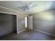Bedroom featuring neutral walls, carpeted floors, ceiling fan and a closet at 76 Lyerly Rd., Hemingway, SC 29554