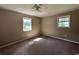 Bedroom featuring two windows and a ceiling fan at 76 Lyerly Rd., Hemingway, SC 29554