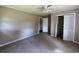 Bedroom with neutral walls, carpeted floors, ceiling fan and a closet at 76 Lyerly Rd., Hemingway, SC 29554