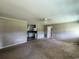 Spacious living room featuring neutral walls and a seamless transition to the kitchen area at 76 Lyerly Rd., Hemingway, SC 29554