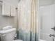 Bathroom with shower, tub, towel rack and a seashell-themed curtain at 769 Country Club Dr., Pawleys Island, SC 29585